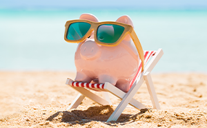 Piggy Bank on a beach chair